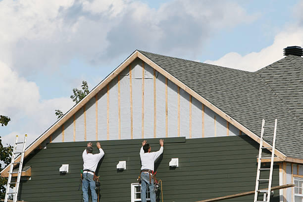 Professional Siding Contractor technician working in Boxborough, MA